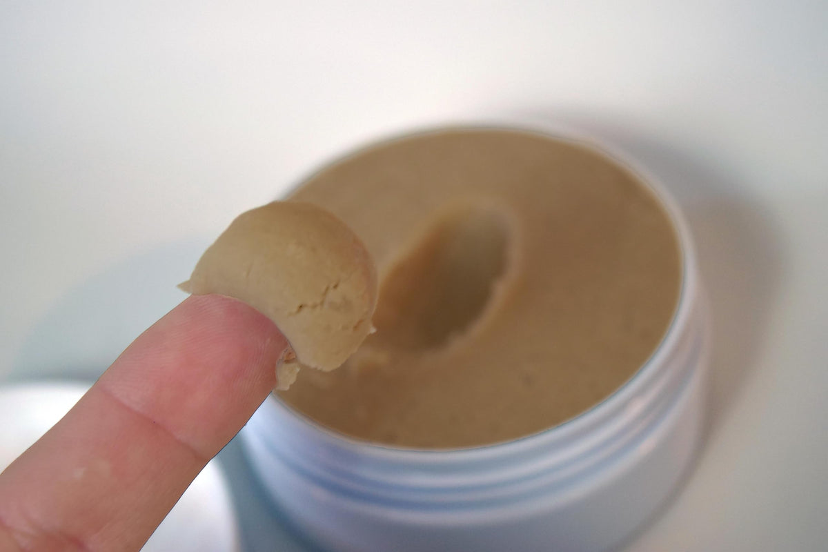 Zero Shine open jar close-up showing fine powder texture and mattifying benefit