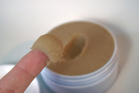 Zero Shine open jar close-up showing fine powder texture and mattifying benefit