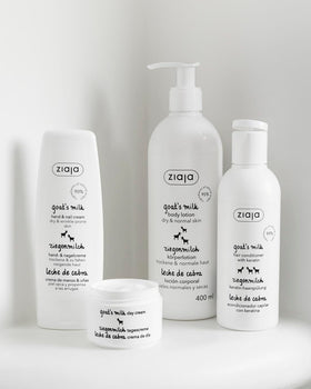 Person applying Ziaja goat's milk lotion to leg demonstrating fast absorption and softness