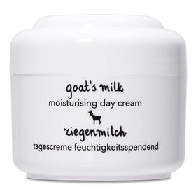 Ziaja Goat's Milk cream texture close-up illustrating smooth consistency for quick absorption