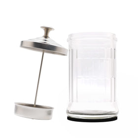 ZIBARBER jar in use with barber shears and combs for organized soaking