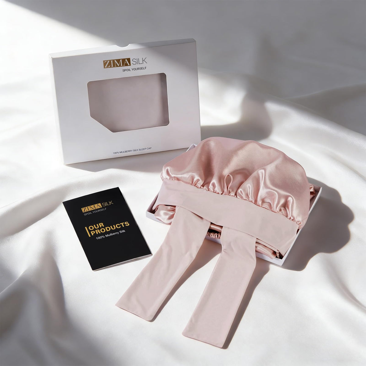 ZIMASILK bonnet on bedside table in calm bedroom setting for luxury nightly routine