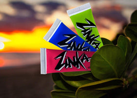Zinka lifestyle beach scene with brand protecting active outdoor users