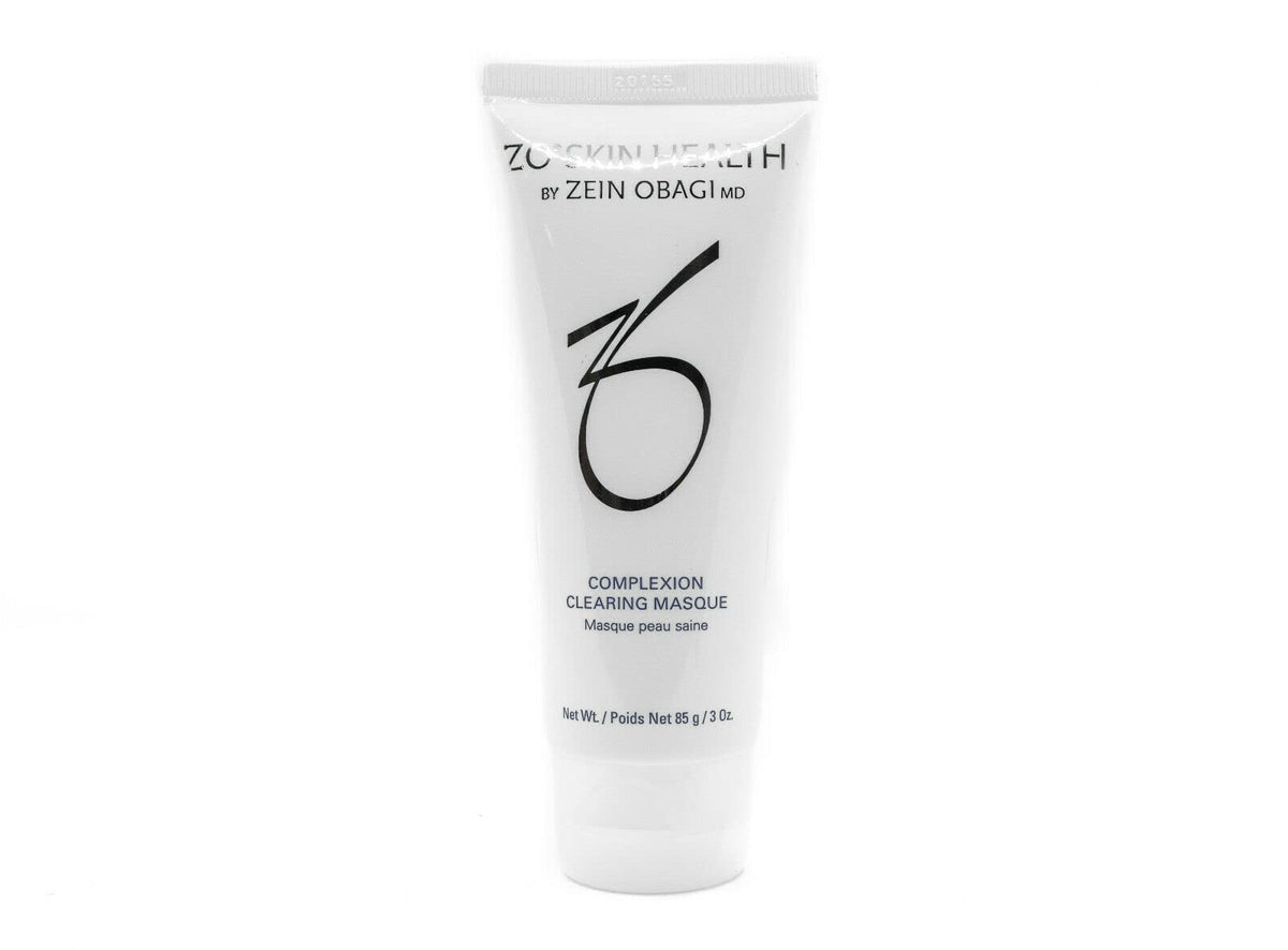 Hand applying ZO SKIN HEALTH masque to cheek demonstrating easy application and oil control