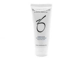 Hand applying ZO SKIN HEALTH masque to cheek demonstrating easy application and oil control