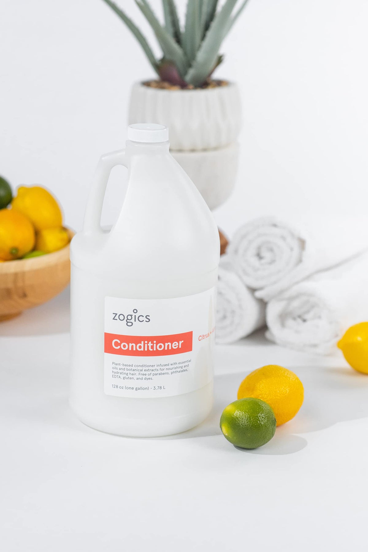 Zogics conditioner in a gym shower setting illustrating bulk use and member convenience