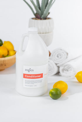 Zogics conditioner in a gym shower setting illustrating bulk use and member convenience