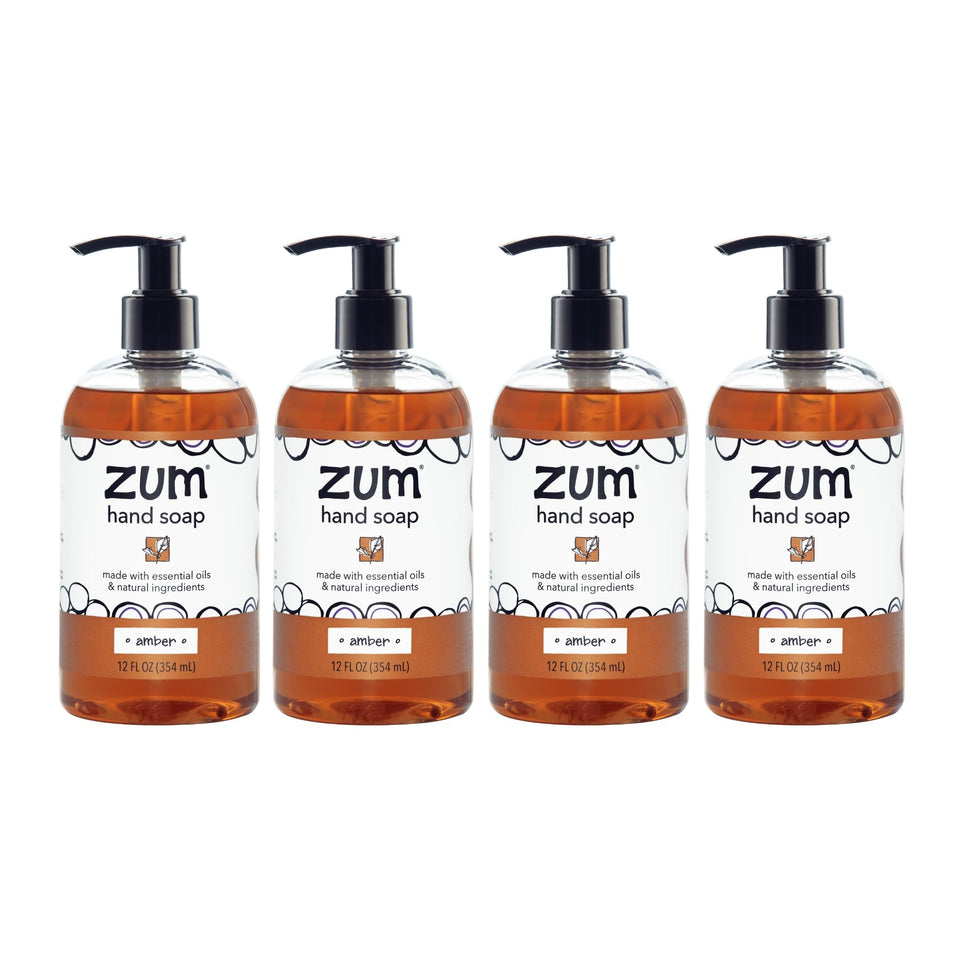 Zum front packaging showing four amber soap bottles and convenient pump access